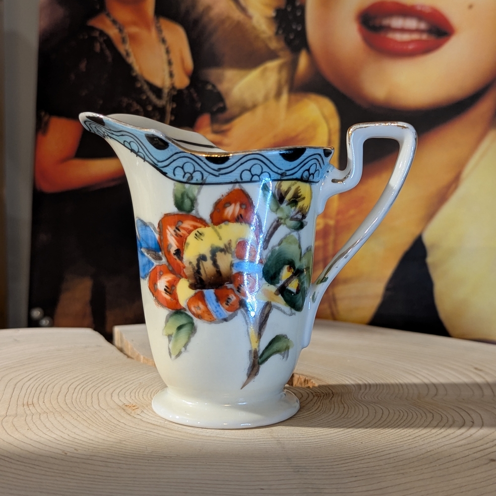 vintage Noritake Floral Ceramic Pitcher with Blue and Orange Accents